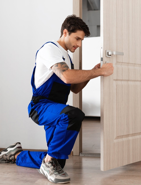 man checking door lock