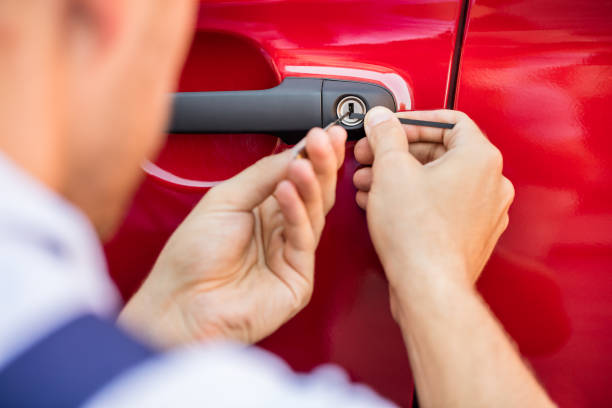 man open a car door lock