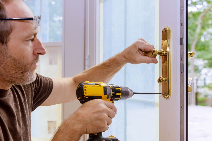 person repair home door lock